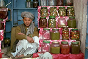 One Man Only Prints: Portrait of a Pathan man at his stall selling pickles in Kabul, Afghanistan, Asia