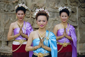 Finger Prints: Portrait of three traditional Thai dancers