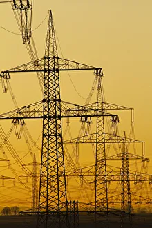 Orange Colour Prints: Power lines in morning light, Germany, Europe