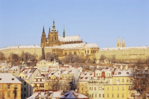 Prague Castle and houses of Mala Strana suburb in winter, Prague, Czech Republic, Europe Prague Castle and houses of Mala Strana suburb in winter, Prague, Czech Republic, Europe