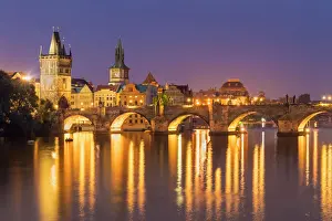 Light Beam Prints: Prague Charles bridge, Old town bridge tower and river Vltava at night, UNESCO World