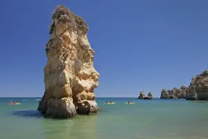 Kayaking Prints: Praia da Dona Ana beach, group of kayaks on a trip to Ponta da Piedade Cape, Lagos