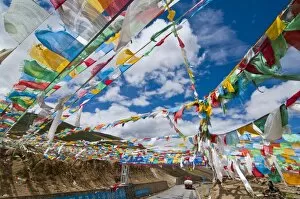 Images Dated 7th August 2010: Prayer flags crossing the Friendship Highway between Lhasa and Kathmandu