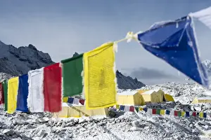 Base Camp Prints: Prayer flags and the Everest base camp at the end of the Khumbu glacier that lies at 5350m