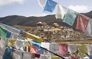 Prayer Flag Prints: Prayer flags and Ganden Sumsteling Gompa (Gandan Sumtseling) (Songzanlin Si) Buddhist Monastery