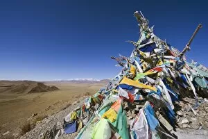 Images Dated 9th October 2008: Prayer flags and sacred site overlooking Bayanbulak, Xinjiang Province, China, Asia