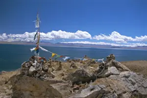 Prayer flags over sky burial site, Lake Manasarovar (Manasarowar), sacred lake just south of Kailas (Kailash), Tibet