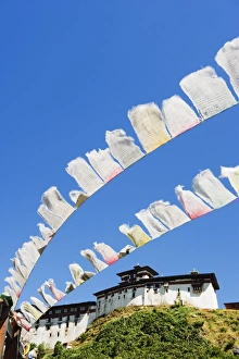 Images Dated 30th September 2009: Prayer flags below Wangdue Phodrang Dzong, founded by the Zhabdrung in 1638, Bhutan, Asia