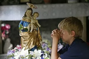 Images Dated 15th August 2007: Prayer at Notre-Dame de la Gorge, Haute Savoie, France, Europe