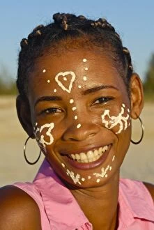 Images Dated 15th August 2007: Pretty Madagascan girl with traditional paint on her face, Morondave, Madagascar, Africa