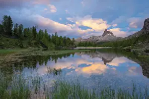 Mountain Ranges Prints: Pristine alpine Lake Federa and Becco di Mezzodi mountain lit by sunset
