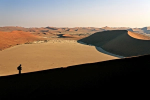 Deadvlei Prints: Profile of a hiker on the sand dune shaped by the wind, Deadvlei, Sossusvlei, Namib Desert