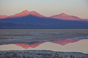 Images Dated 8th July 2009: The profiles of two volcanos of the Cordillera de la Sal reflecting in a pool in the Desert of