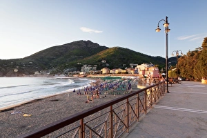 Cinque Terre Prints: Promenade at the beach of Levanto at sunset