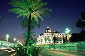 Illumination Collection: The Promenade des Anglais and Hotel Negresco at night, Nice, Alpes Maritimes