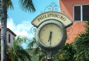 Time Prints: Public clock in Philipsburg displays time during a sunny day in Sint Maarten