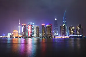 Shanghai Prints: Pudong skyline at night across the Huangpu River, Shanghai, China, Asia