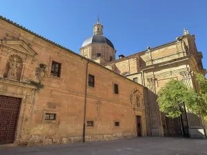 Courtyard Prints: Purisima Concepcion Church in Salamanca showing architectural features and surrounding area under clear blue sky