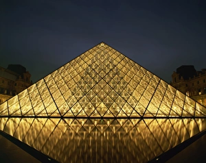 The Pyramide du Louvre illuminated at dusk, Musee du Lourve, Paris, France, Europe