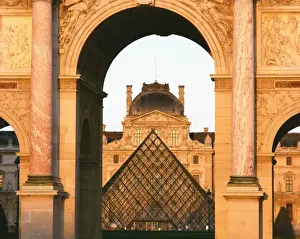 Art Galleries Prints: The Pyramide and Palais du Louvre seen through the Arc de Triomphe du Carousel