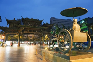 Sichuan Province Prints: Qintai street statue and Chinese gate, Chengdu, Sichuan Province, China, Asia