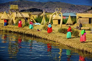Medium Group Of People Prints: Quechua Indian family on Floating Grass islands of Uros, Lake Titicaca, Peru, South