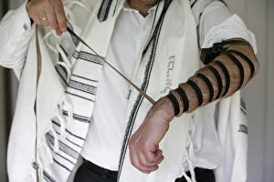 Images Dated 9th April 2007: Rabbi putting on phylacteries, Paris, France, Europe