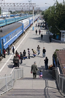 Carriages Prints: Railway station with passengers and trains, Almaty, Kazakhstan, Central Asia, Asia