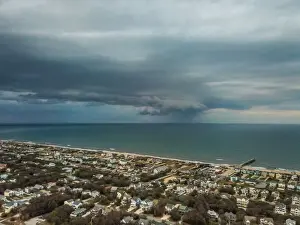 North Carolina Prints: Rain squall moves across the Atlantic Ocean offshore of Nags Head, North Carolina