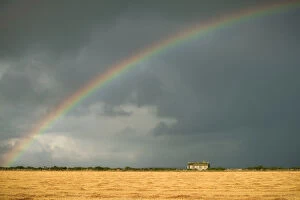 Moody Sky Gallery: Rainbow over an abandoned cottage on a stormy Scottish Day, Scottish Highlands, United