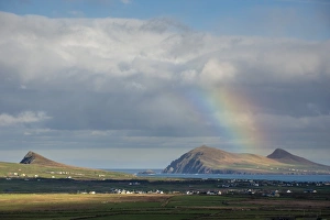 Rainbow over hills and dwellings, looking towards Clogher and Rosroe, Dingle Peninsula