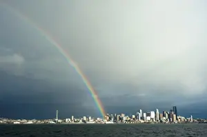Hope Prints: A rainbow lands on a Washington State Ferry in the Puget Sound with the Seattle skyline in the background