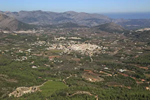 White Buildings Prints: Raised view over Parcent village and Pop Valley