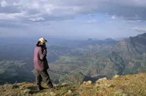 Ranger and mountain scenery, Simien Mountains National Park, UNESCO World Heritage Site