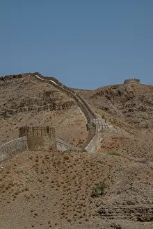 Military Prints: Ranikot fort stands on the mountain range overlooking the dry landscape in Sindh