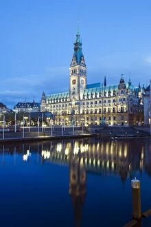 Images Dated 20th June 2010: Rathaus (City Hall) illuminated at night reflected in a canal, Hamburg, Germany, Europe