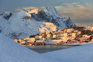 Reine Prints: The last rays of sun on the fishing village and the snowy peaks, Kvalvika, Andoya