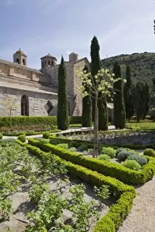 Images Dated 13th April 2011: Rear of the Abbey Church from The Rose Garden in Fontfroide Abbey, Languedoc-Roussillon, France