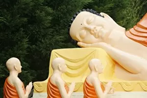 Reclining Buddha statue depicting the Parinirvana, Sainte-Foy-les-Lyon