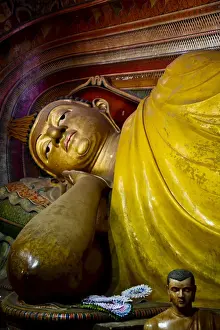 Reclining Prints: Reclining Buddha statue inside Wewurukannala Vihara Temple, Dikwella, Sri Lanka, Asia