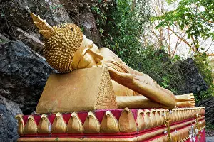Southeast Prints: Reclining Buddha statue on the path to the stupa of Wat Chom Si on the summit of Mount Phu Si