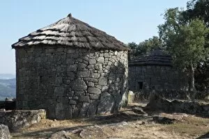 Images Dated 24th July 2010: Reconstructed round houses in the Celtic hill settlement dating to the Iron Age at Citania de