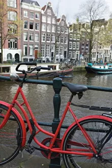Railing Gallery: Red bicycle by the Herengracht canal, Amsterdam, Netherlands, Europe