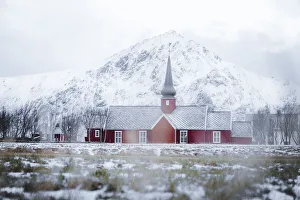 Focus On Background Prints: Red church of Flakstad in winter fog