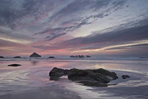 Sea Stacks Prints: Red clouds, sea stacks, and rocks at sunset