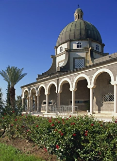 Red hibiscus in front of the Church on the Mount of Beatitudes, above the Sea of Galilee Red hibiscus in front of the Church on the Mount of Beatitudes, above the Sea of Galilee