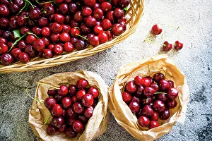 Still Life Prints: Red organic cherries in baskets ready to eat from above, Italy, Europe