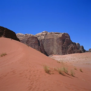 Wadi Rum Prints: Red sand dune and desert landscape