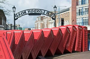 Surrey Collection: Red telephone box sculpture entitled Out of Order by David Mach, Kingston upon Thames