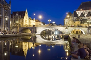Flanders Prints: Reflection of arched bridge and waterfront town houses, Ghent, Flanders, Belgium, Europe